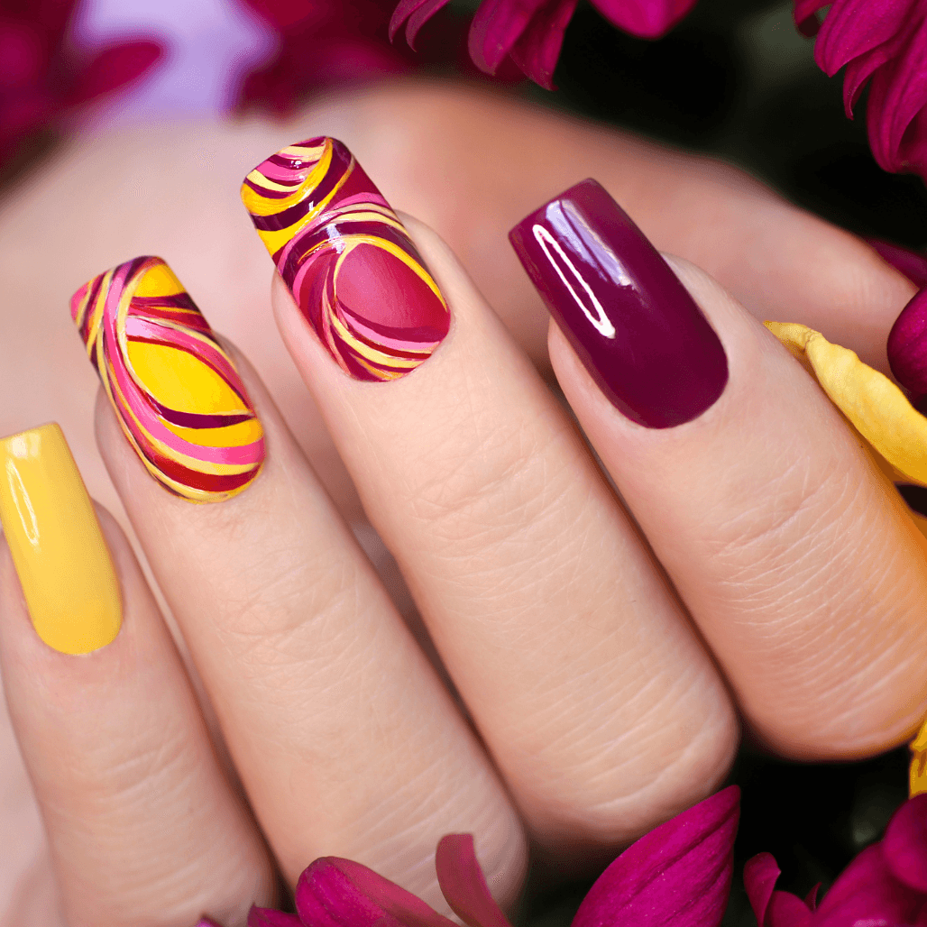 Bright, artistic gel nails at The Dolls House Boutique in Old Town Eastbourne – long-lasting nail treatments with stylish designs.